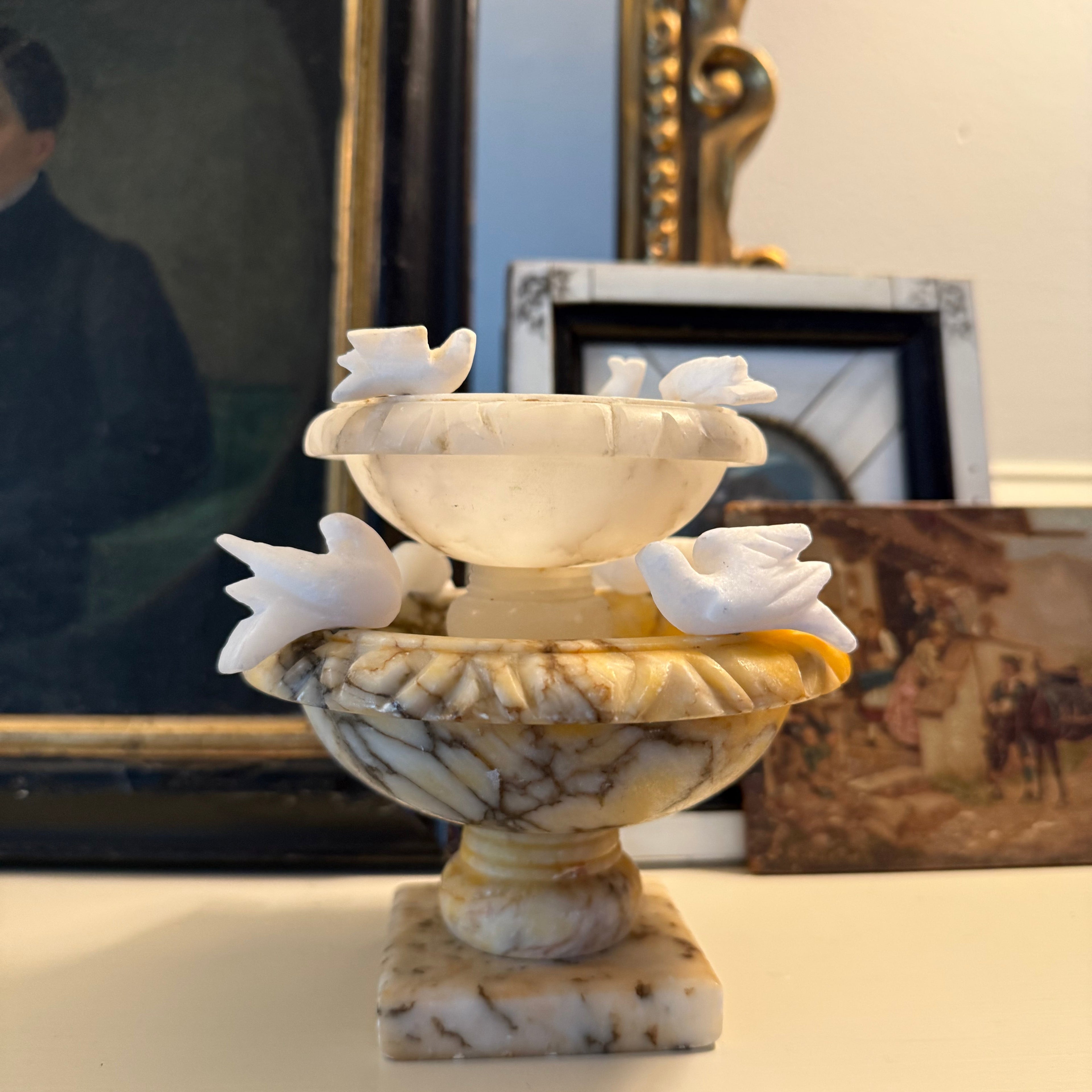 stacked alabaster bird baths