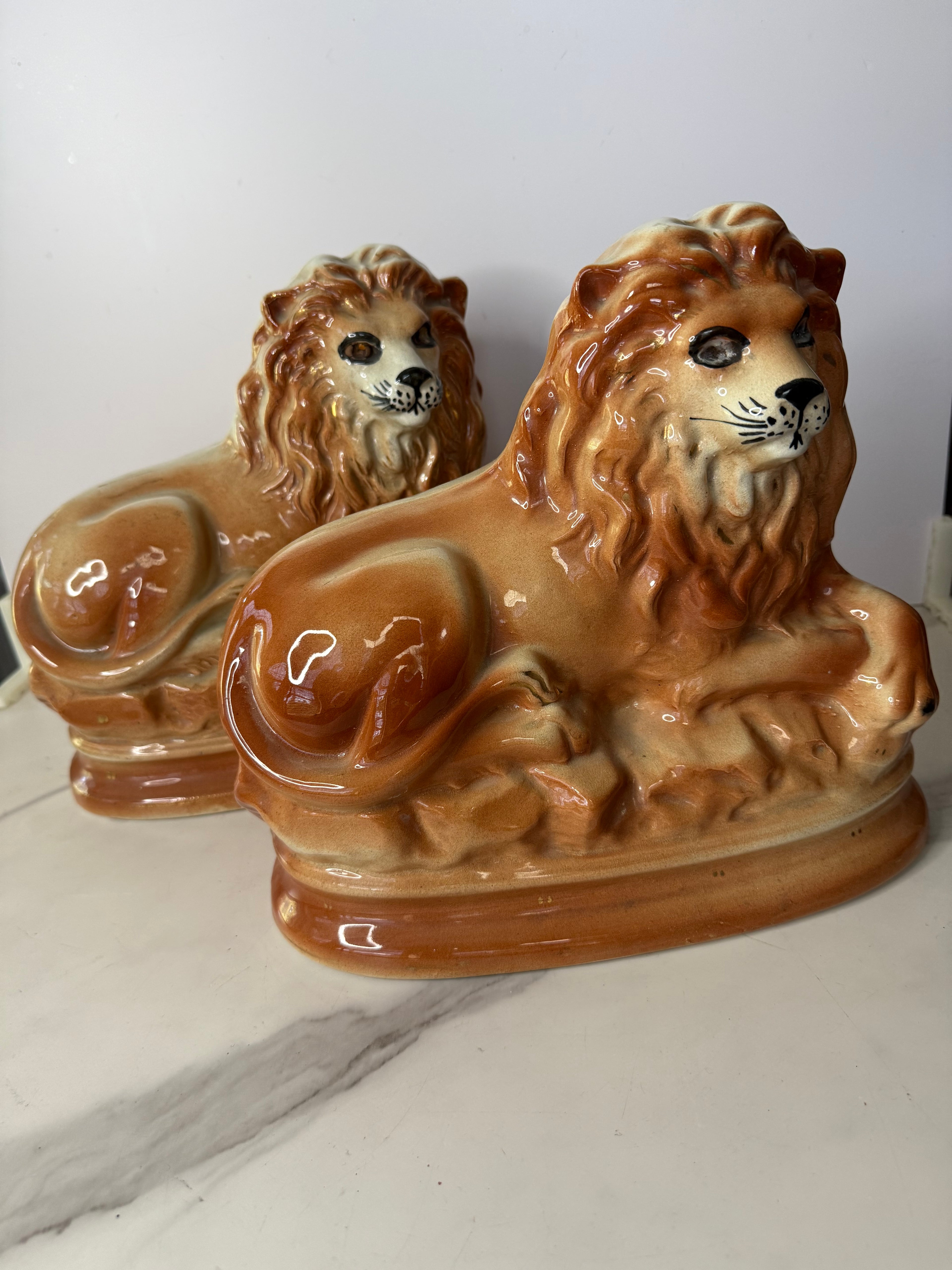 Antique Staffordshire Recumbent Lion Pair