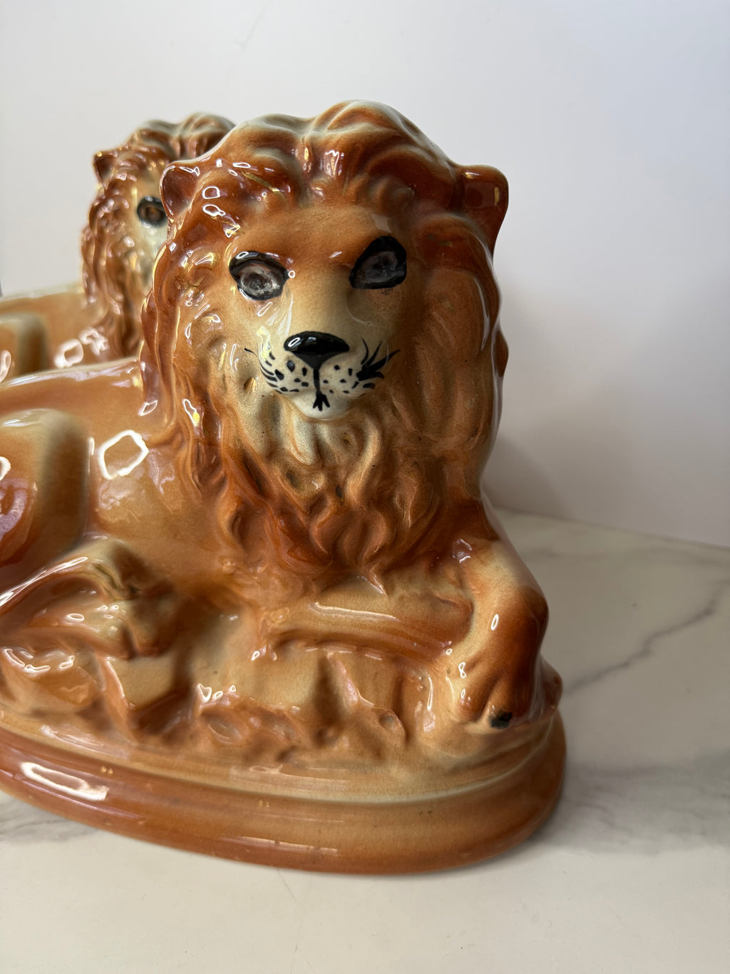 Antique Staffordshire Recumbent Lion Pair