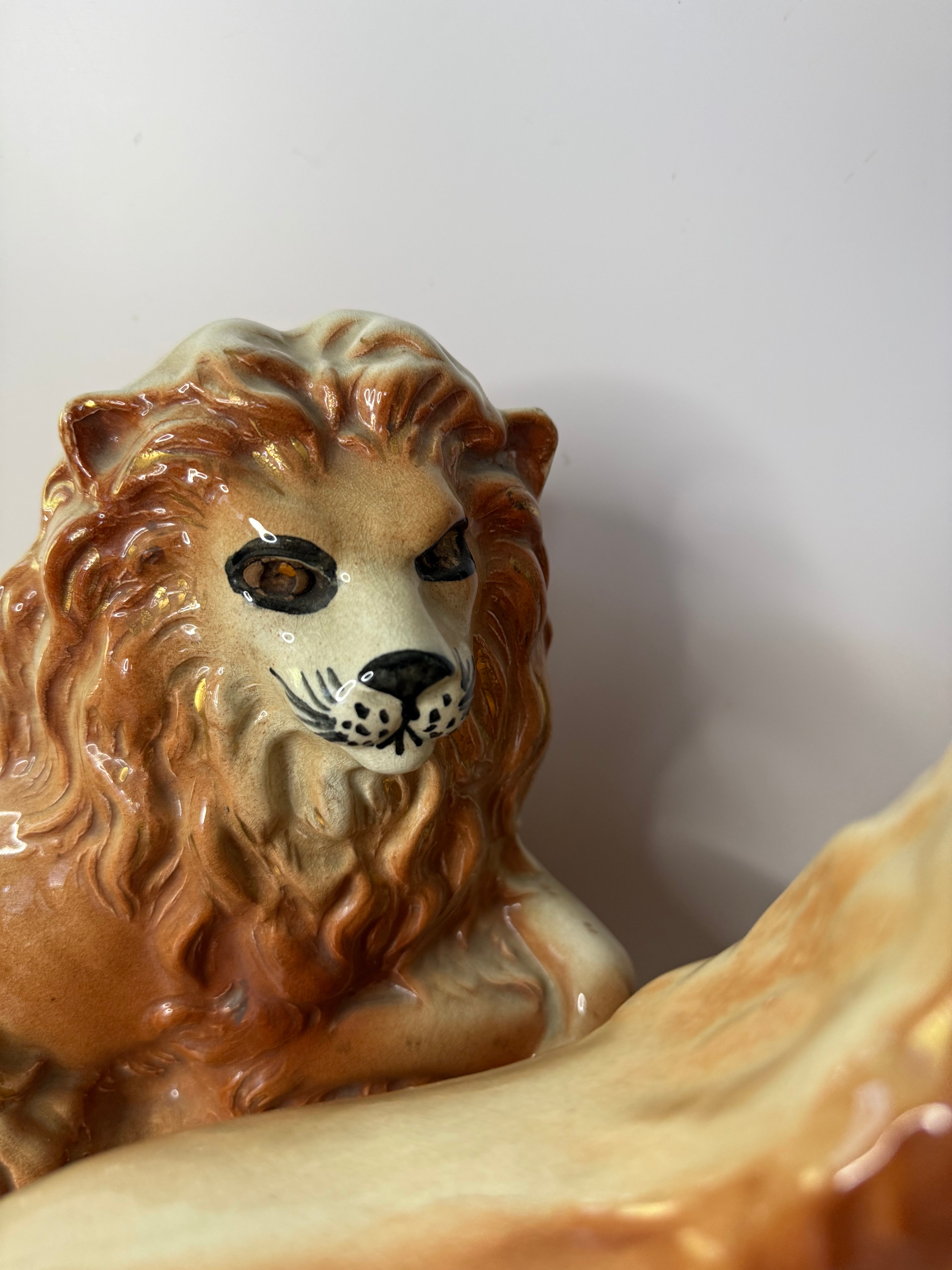 Antique Staffordshire Recumbent Lion Pair
