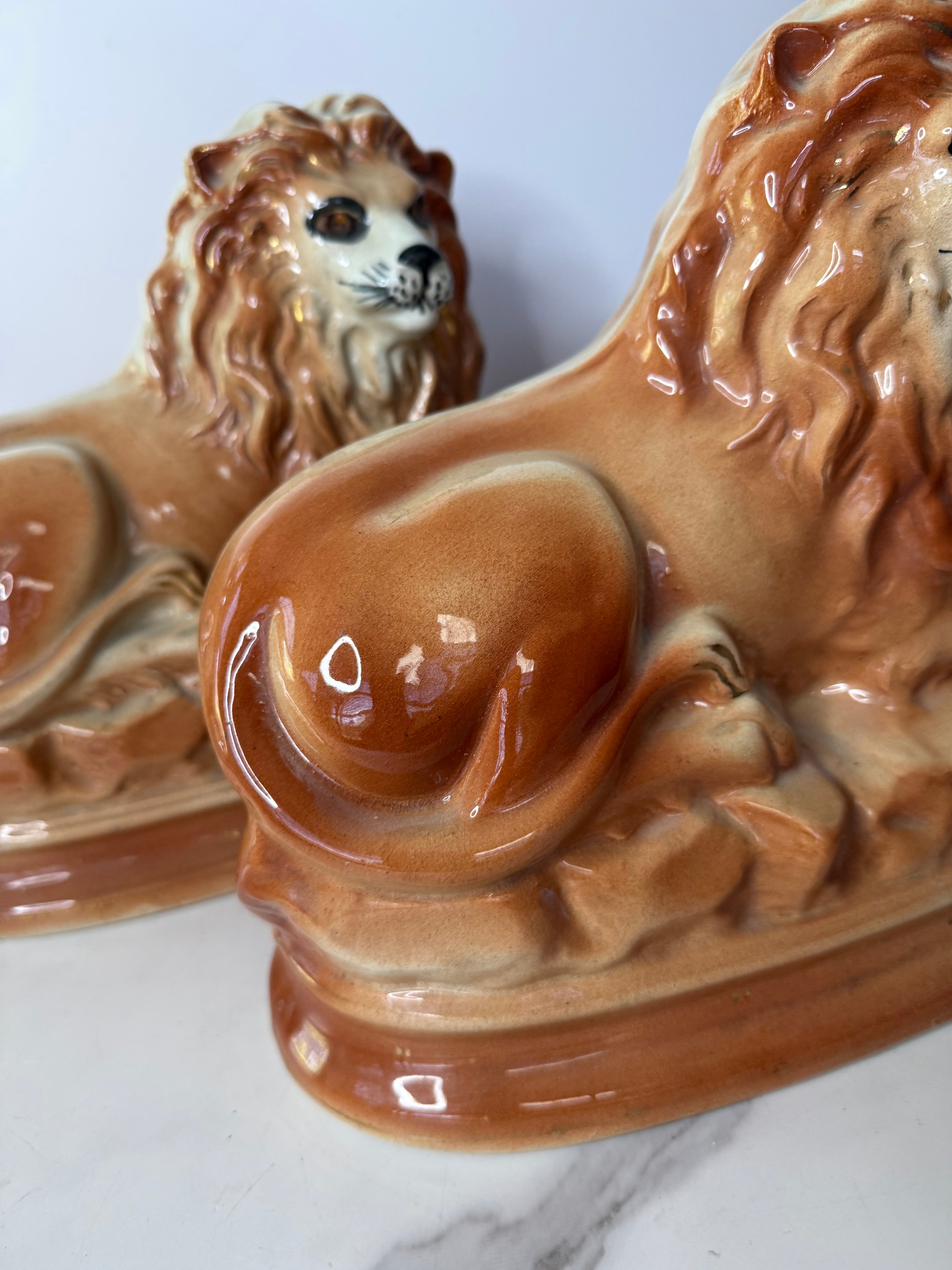 Antique Staffordshire Recumbent Lion Pair