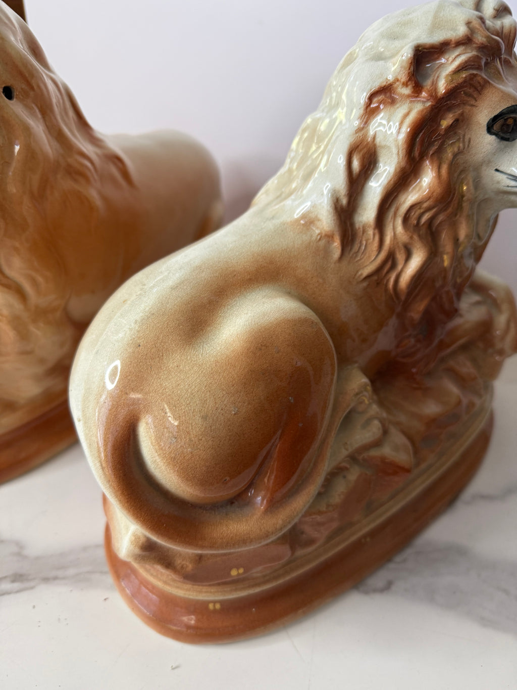 Antique Staffordshire Recumbent Lion Pair